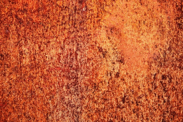 Orange vif, texture rouillée d'une vieille feuille de métal.