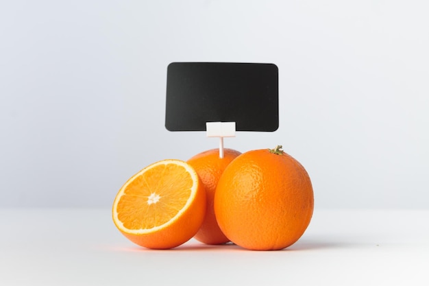 Oranges avec porte-prix