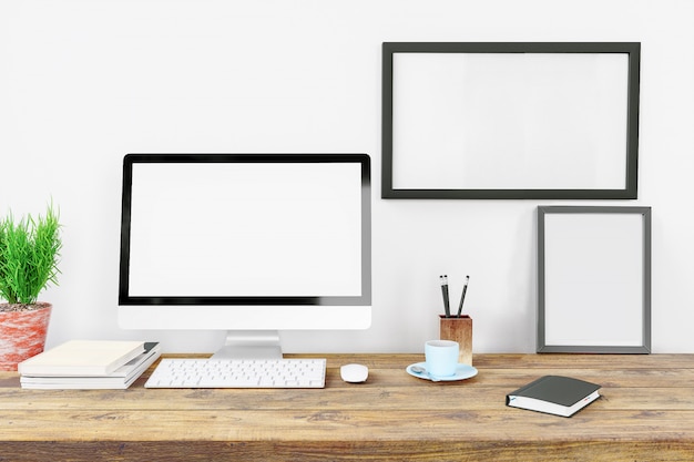 Ordinateur écran vide écran et outils de bureau sur le bureau de l&#39;espace de travail créatif