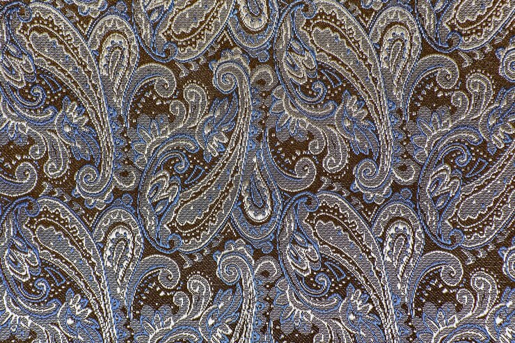 Photo oriental ou paisley, concombre turc, larme d'allah, beanbuta indien ou turc, texture d'arrière-plan ornement cyprès persan