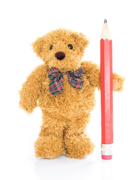 Ours en peluche avec un crayon rouge