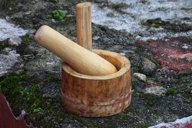 Photo outil de broyage du chili en bambou