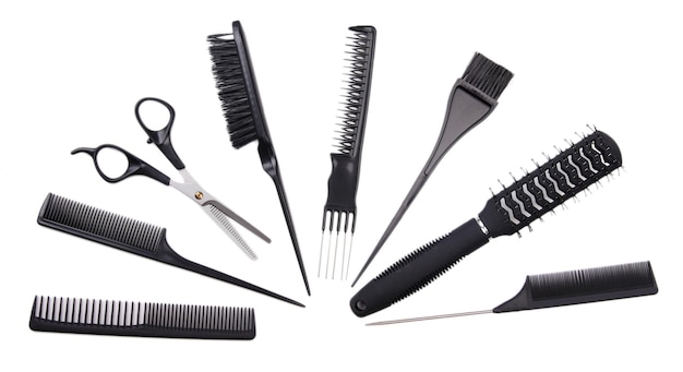 Outils de coiffeur professionnel isolés sur blanc