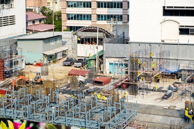 Photo ouvrier et bâtiment