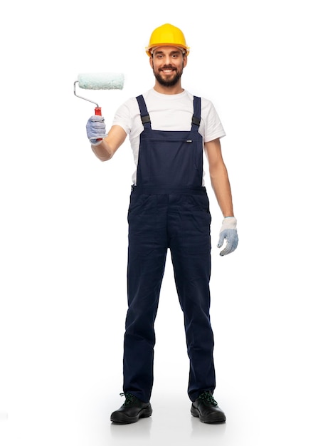 ouvrier ou bâtisseur masculin avec rouleau de peinture