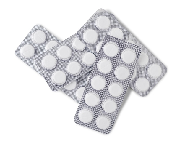 Packs d'argent de pilules blanches isolés sur fond blanc. Vue de dessus. Concept de pharmacie.