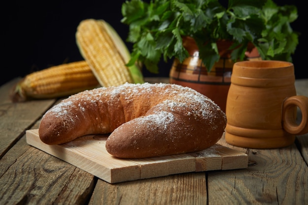 Photo pain sur une plaque de bois