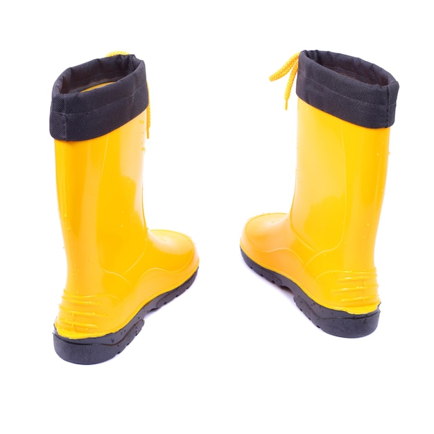 Paire de chaussures en caoutchouc jaune vif