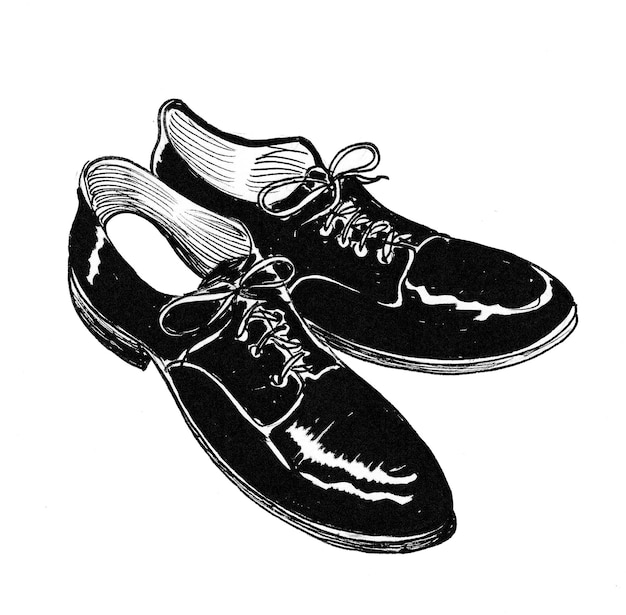 Paire de chaussures classiques pour hommes. Dessin noir et blanc à l'encre