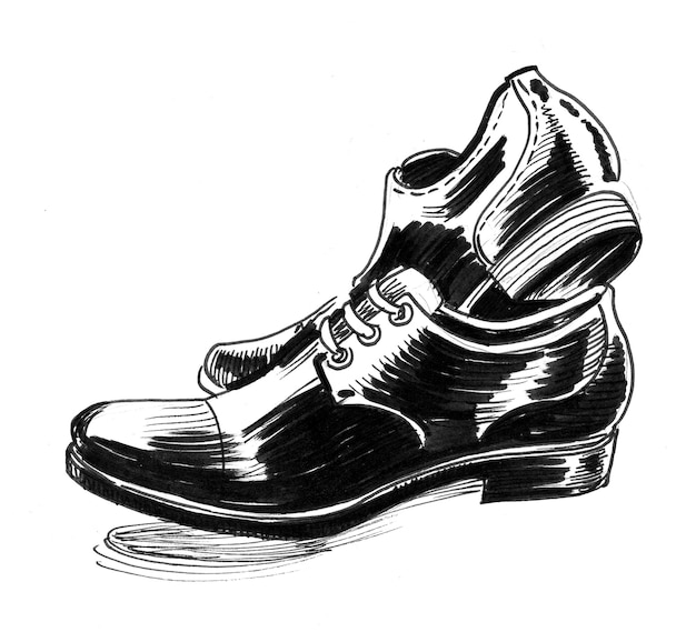 Paire de chaussures masculines classiques. Dessin noir et blanc à l'encre