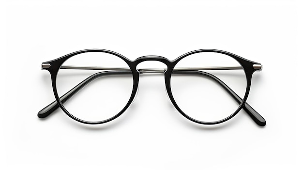 Photo une paire de lunettes avec une paire de ciseaux sur un fond blanc.