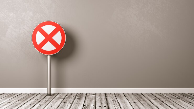 Photo panneau de signalisation d'interdiction sur plancher en bois