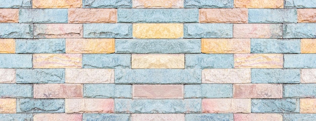 Panorama du motif et de l'arrière-plan du mur de pierre moderne de couleur