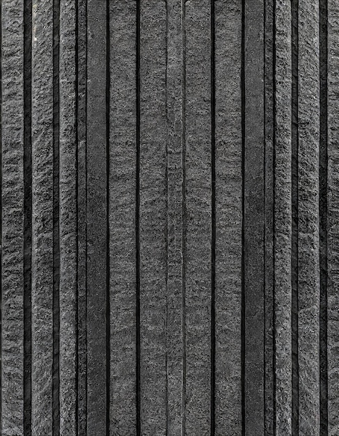 Panorama du mur de pierre noire moderne avec une texture à rayures et un fond sans couture