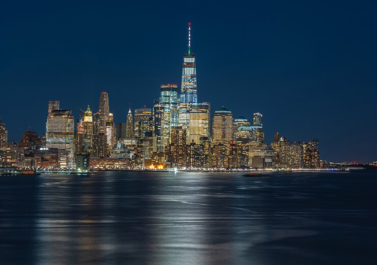 Photo panorama de la ville de new york côté rivière au crépuscule, usa