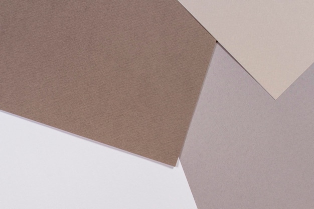 Papier de couleur composition géométrique fond avec des tons gris et bruns