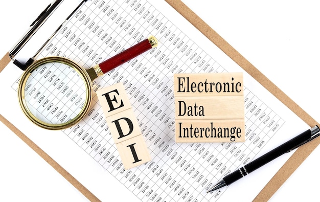 Papier avec échange de données informatisées EDI une table sur un concept d'entreprise de graphiques