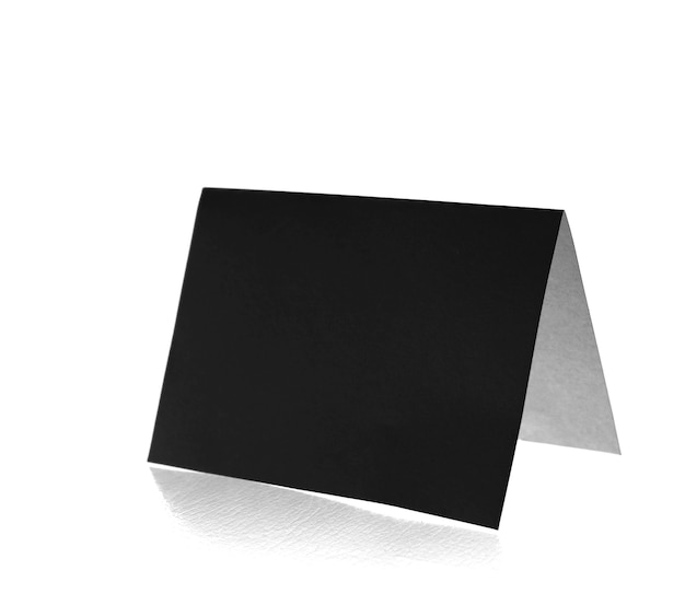 Photo papier noir déchiré isolé sur fond blanc