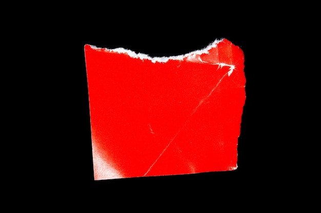 Un papier rouge sur lequel est inscrit le mot « rouge ».