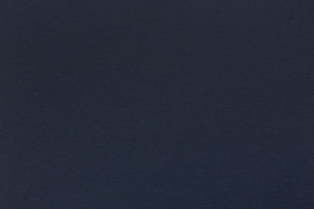 Papier de surface de toile couleur bleu foncé de la texture grunge de fond pour le texte. Texture de haute qualité en très haute résolution