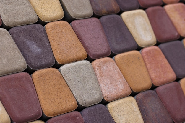 Pavé de carreaux de béton trapézoïdal coloré avec coins arrondis en perspective diagonale