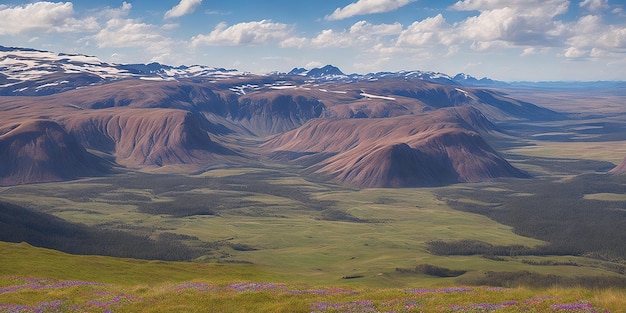 Un paysage avec des montagnes et un ciel bleu avec des nuages