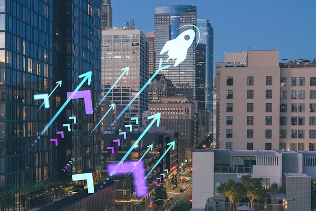 Paysage urbain illuminé du centre-ville de Los Angeles la nuit Californie États-Unis Gratte-ciel de la ville de LA Une start-up lance un projet visant à développer et à valider un hologramme de modèle d'entreprise évolutif