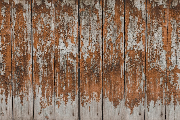 Peint le vieux fond de mur rouge en bois.