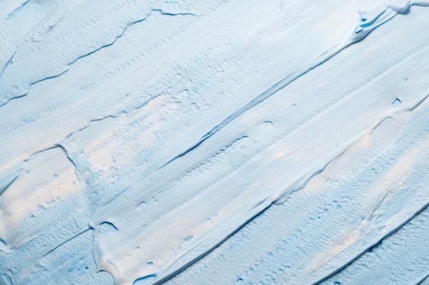 Peinture acrylique bleu ciel Fond abstrait créatif Gros plan de la surface de la texture des coups de pinceau