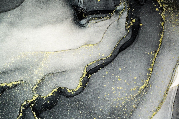 Peinture à l'alcool abstraite de fond fluide de couleur brillante brillante dessinée à la main avec une texture de technique d'encre liquide de stries dorées pour la conception de toile de fond haute résolution