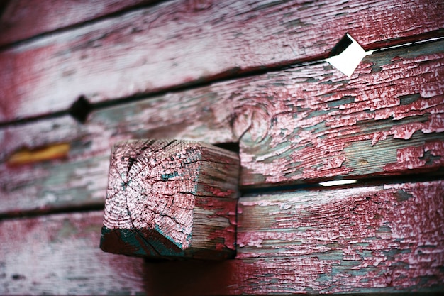 Peinture ancienne rose sur la planche de bois