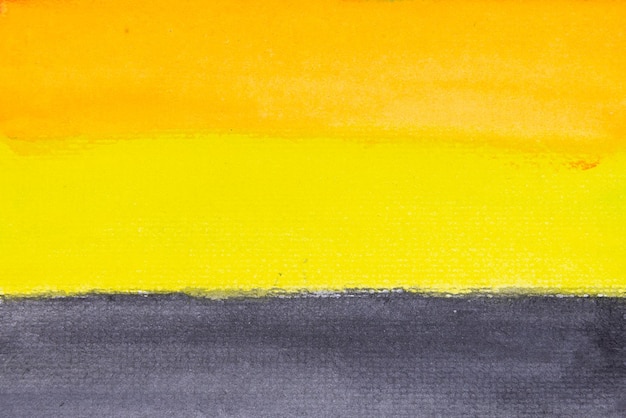 Peinture à l'aquarelle jaune et noire orange sale sur fond de papier