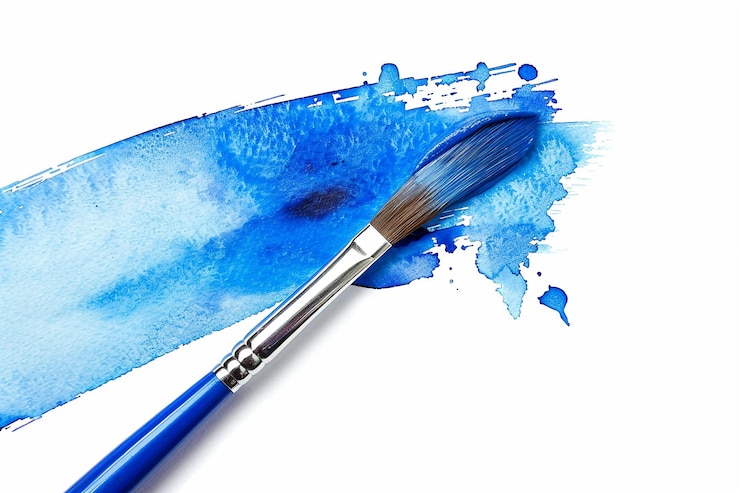 Photo peinture à l'aquarelle à pinceau bleu isolée sur fond blanc