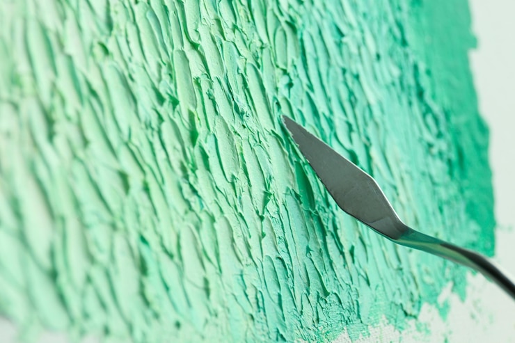 Photo peinture d'art abstrait coloré avec vue rapprochée de la spatule