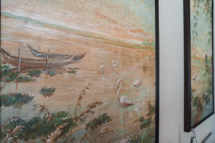 Photo peinture élégante encadrée de flamants roses au bord d'un lac dans l'intérieur d'un hôtel de luxe