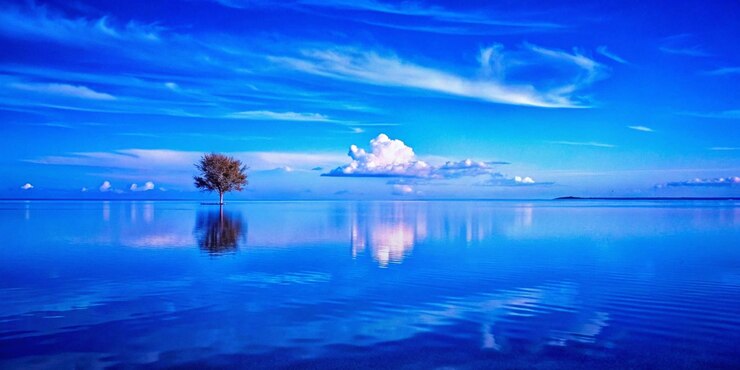 Photo une peinture d'un lac avec des arbres et des nuages dans le ciel