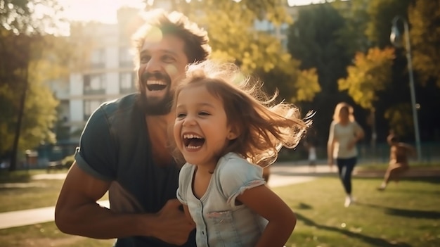 Le père joue avec la fille qui rit. La joie vomit.