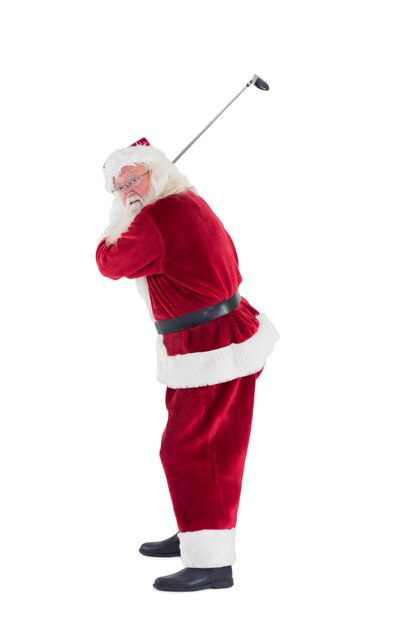 Père Noël balance son club de golf