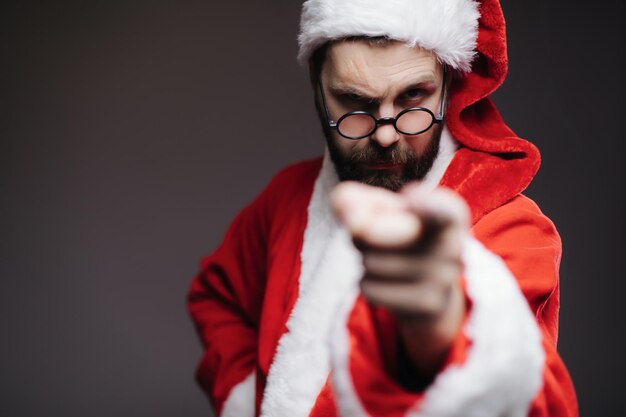 Photo père noël faisant des gestes avec le doigt