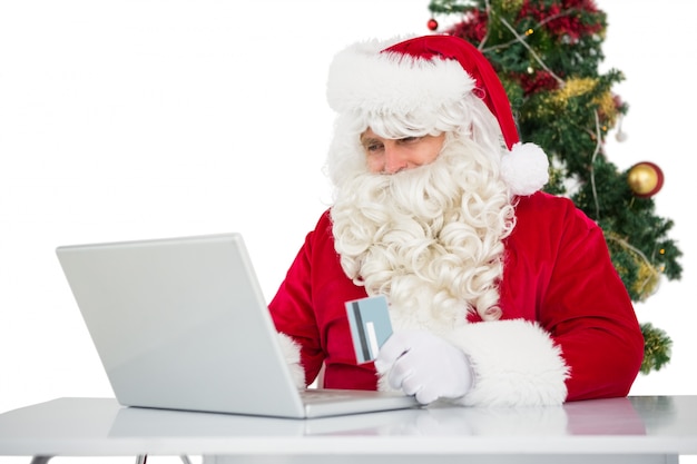 Père Noël, magasinage en ligne avec ordinateur portable