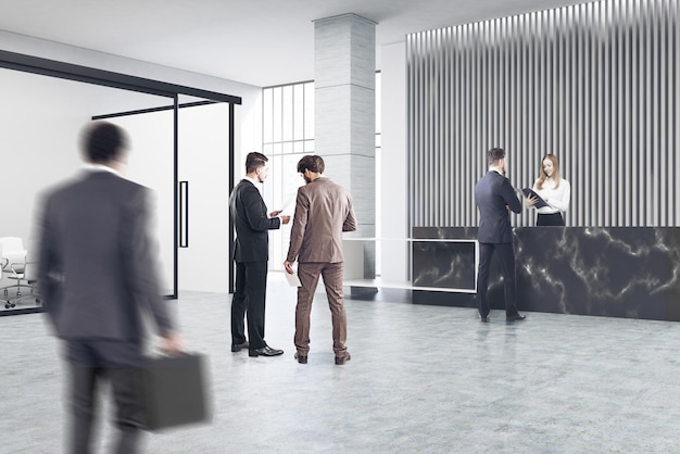 Personnes près d'un comptoir de réception en marbre noir de construction originale se tenant dans un hall de bureau avec une salle de réunion en verre. rendu 3d
