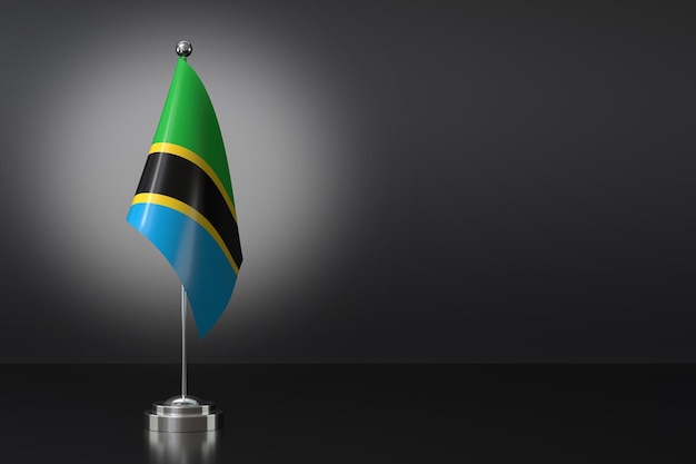 Petit drapeau national de la République unie de Tanzanie sur un fond noir Rendering 3D
