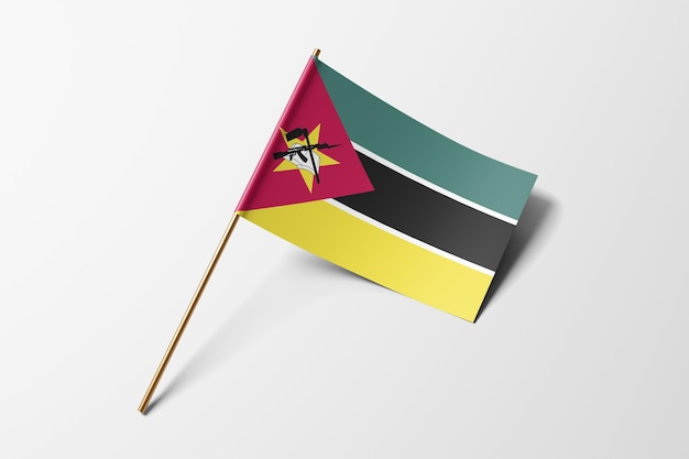 Photo petit drapeau en papier du mozambique sur fond blanc