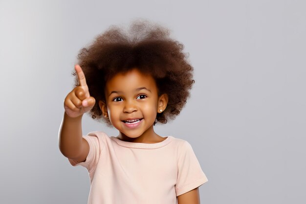 Une petite fille afro-américaine heureuse montrant du doigt l'IA générative