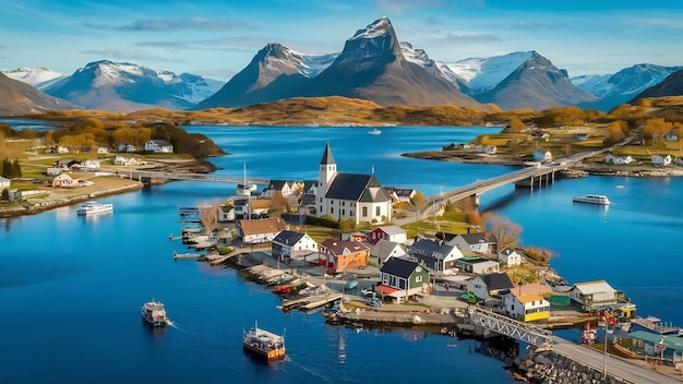 Photo une petite ville près d'une étendue d'eau bleue entourée de belles montagnes