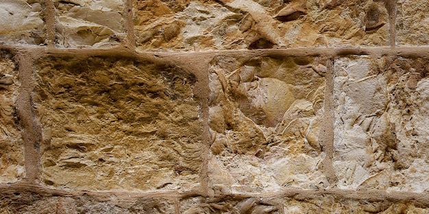 photo d'un beau mur de briques vintage à l'intérieur de la maison, large panorama du mur de briques