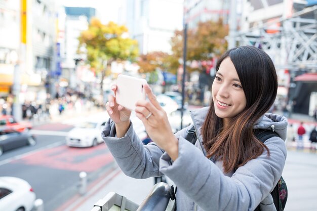 Photo de capture de femme par téléphone portable