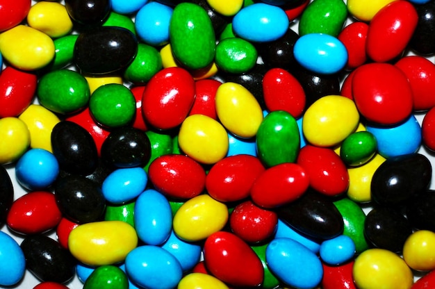 Photo une photo complète de bonbons multicolores