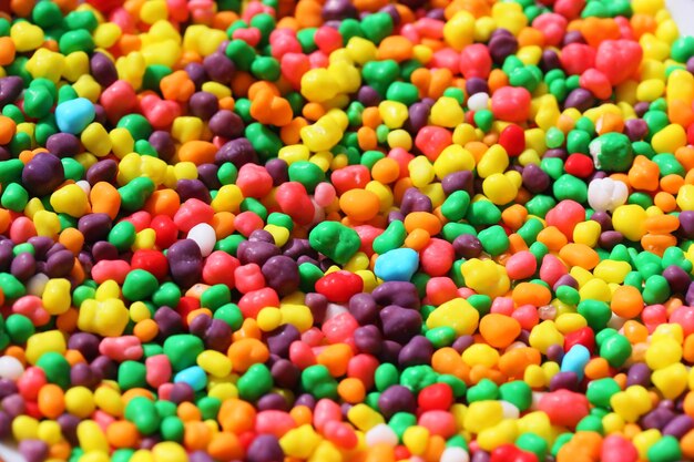 Photo une photo complète de bonbons multicolores