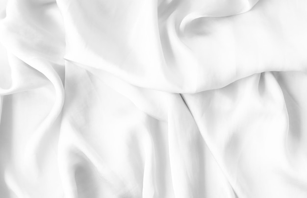 Une photo complète du drap de lit blanc.